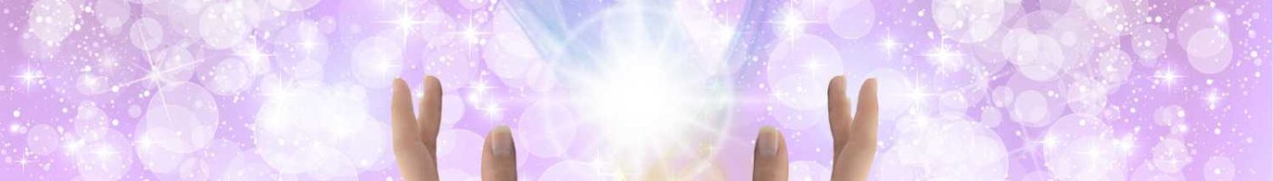 Orbs and sparkles of healing light on a purple background.